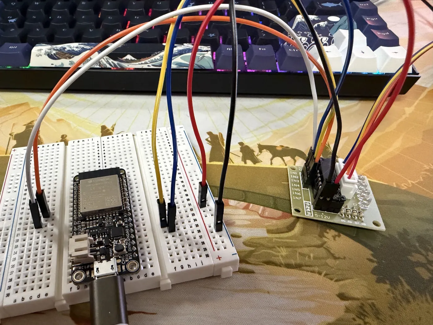 ESP32 breadboard connected to ULN2003 stepper driver board via colorful jumper wires — the wiring setup before the power rail fix