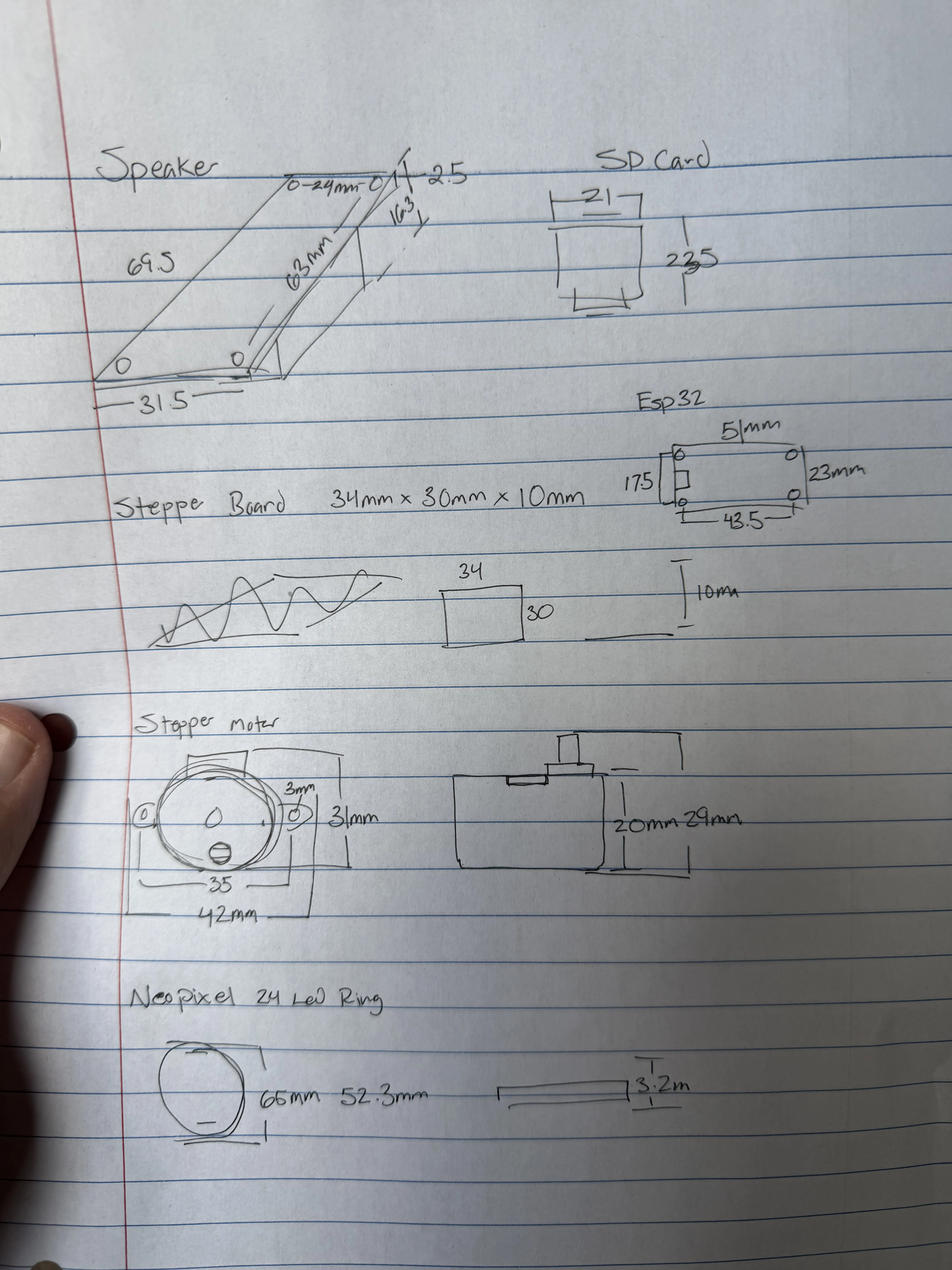Full notebook page of hand-drawn component measurements: speaker, SD card, ESP32, stepper driver board, stepper motor, and NeoPixel ring, each with caliper readings in millimeters